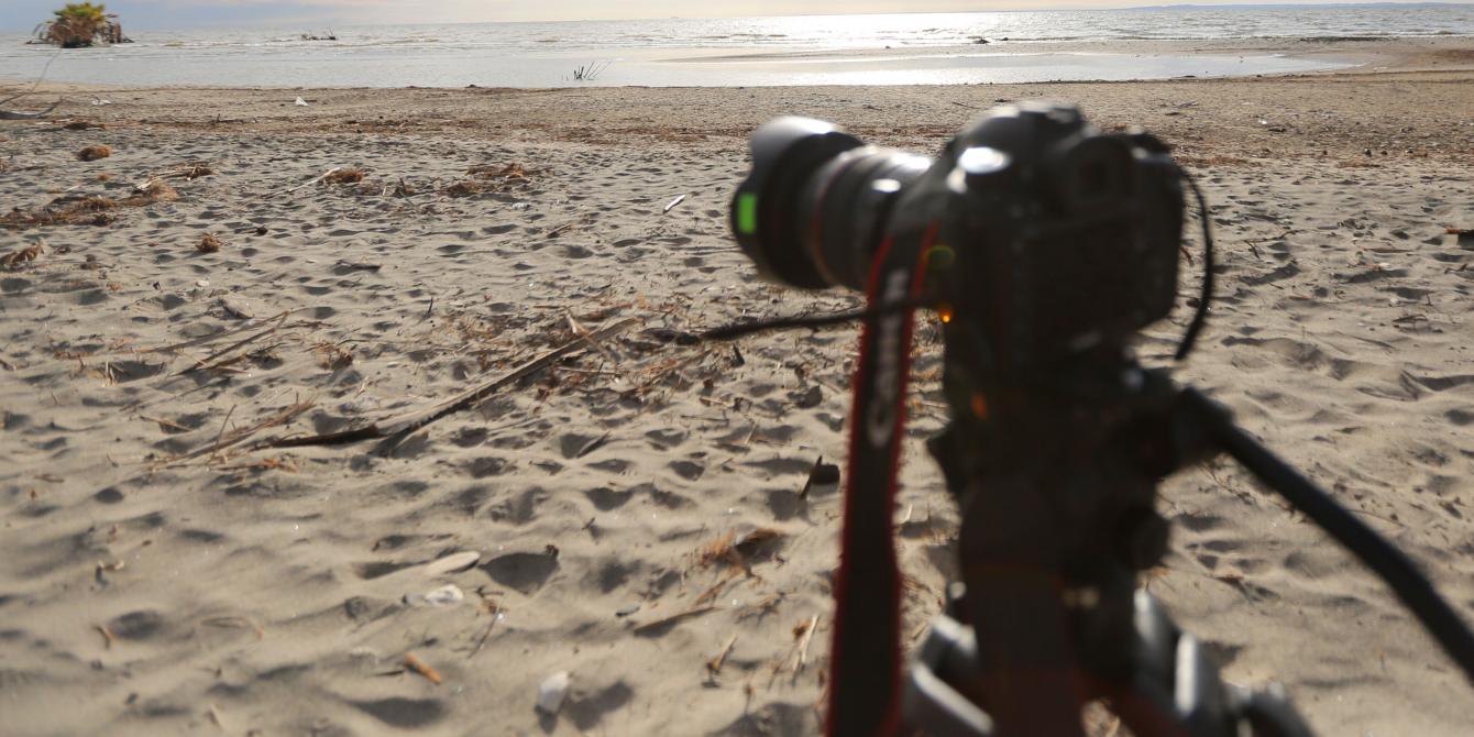 Camera set to capture shot of fishermen approaching the Lake Turkana shore. Photo Credit: Brian Inganga Camera set to capture shot of fishermen approaching the Lake Turkana shore. Photo Credit: Brian Inganga